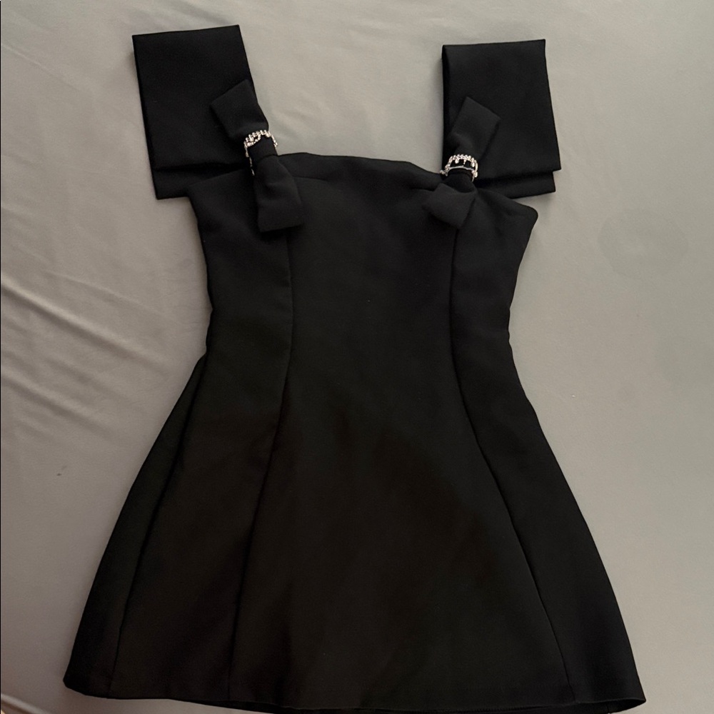 Elegant Black Dress with Bow Accents